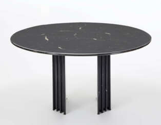 Table with base made of black veined marble slabs placed side by side on a metal substructure, circular top in black marble