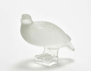 Sculpture depicting a bird in blown glass in a transparent colorless mold partially etched on the external surface