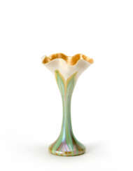 Vase with body in the shape of a bulbiform flower, in white and yellow iridescent glass paste, with green and orange leaves decoration