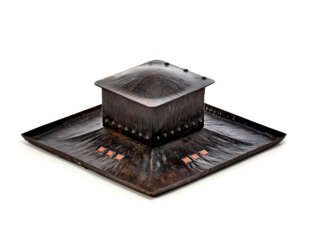 Inkwell of Wiener Secession style in embossed iron sheet and decorated with orange enamelled relief squares