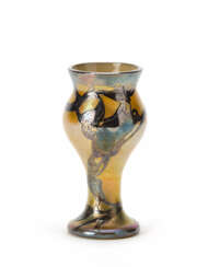 Slightly iridescent ocher yellow blown glass vase with whip line decorations applied in slight relief in silver foil