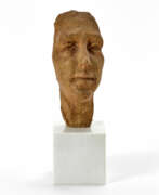 Enrico Mazzolani. Terracotta sculpture mounted on a marble base depicting a face