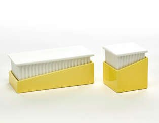 Two boxes in white and yellow ceramic