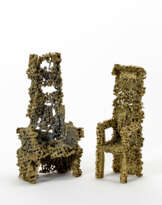 Two bronze sculptures depicting chairs