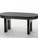 Novecento table with oval top that can be extended by means of extensions, two arched legs with rounded sides - photo 1