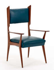 Armchair in solid mahogany with seat and back in green vinyl leather