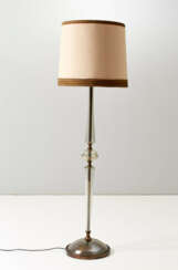Floor lamp in transparent colorless slightly iridescent blown glass, brass elements