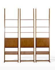 Lot consisting of three modular bookcases in the center with flap cabinet, a lower inclined shelf and three upper shelves model "1955