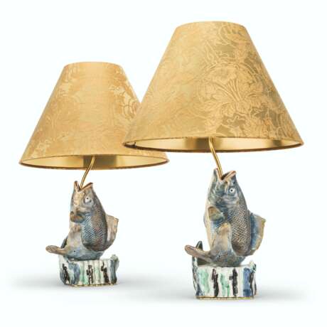 A PAIR OF JAPANESE ARITA MODELS OF LEAPING CARP, LATER MOUNTED AS LAMPS - photo 1