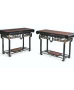 Edouard Lievre. A PAIR OF FRENCH &#39;JAPONISME&#39; GILT-METAL-MOUNTED EBONISED CONSOLE TABLES