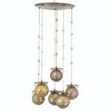AN AUSTIAN PATINATED-BRASS AND DECORATED GLASS CHANDELIER - photo 1