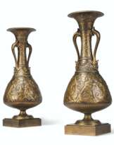 A PAIR OF FRENCH GILT AND PATINATED-BRONZE 'NEO-GREC' VASES