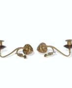 William Arthur Smith Benson (1854-1924). A PAIR OF BRASS AND COPPER CANDLE HOLDERS