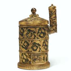 A CONTINENTAL GILT-METAL AND GREEN-PAINTED NOVELTY TABLE CIGAR CASE IN THE FORM OF A STOVE