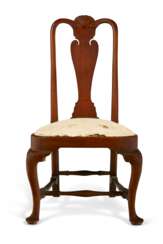 A QUEEN ANNE CARVED WALNUT SIDE CHAIR