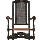 A JACOBEAN BLACK-PAINTED CANED AND CARVED BEECHWOOD ARMCHAIR - photo 1
