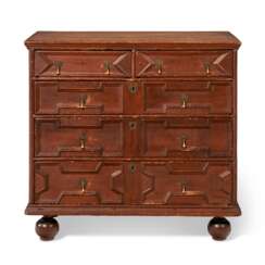 A JOINED RED-PAINTED PINE CHEST-OF-DRAWERS