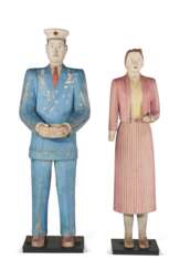 A PAIR OF CARVED AND PAINTED FIGURES OF A MAN AND A WOMAN
