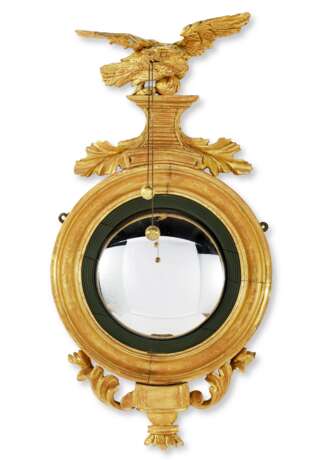 A CLASSICAL EAGLE-CARVED GILTWOOD CONVEX MIRROR - photo 1