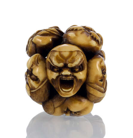 Feines Netsuke aus neun Masken in Elfenbein gestaltet - фото 1