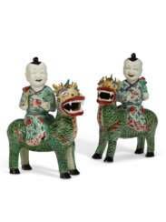 A PAIR OF CHINESE EXPORT PORCELAIN FAMILLE VERTE FIGURES OF BOYS RIDING QILIN