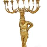 AN ITALIAN GILTWOOD AND COMPOSITION TEN-LIGHT CANDELABRUM - фото 1