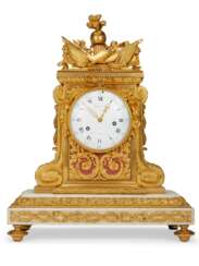 A LOUIS XVI ORMOLU AND WHITE MARBLE MANTEL CLOCK