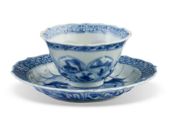 A CHINESE EXPORT PORCELAIN BLUE AND WHITE LOTUS-MOLDED `ACUPUNCTURE` TEABOWL AND SAUCER - photo 1