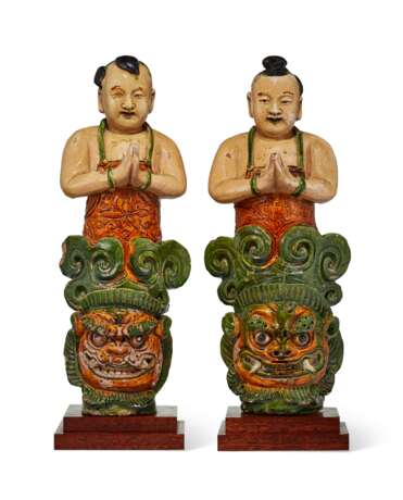 A PAIR OF LARGE CHINESE SANCAI-GLAZED POTTERY FIGURES OF BOYS - photo 1