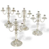 A SET OF FOUR CONTINENTAL SILVER THREE-BRANCH CANDELABRA - photo 1