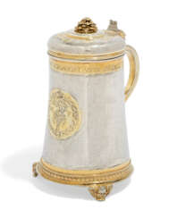 A GERMAN PARCEL-GILT SILVER TANKARD