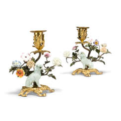 A PAIR OF LOUIS XV ORMOLU-MOUNTED TOLE AND FRENCH AND CHINESE PORCELAIN CANDLESTICKS