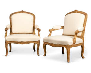 A PAIR OF LATE LOUIS XV GILTWOOD FAUTEUILS