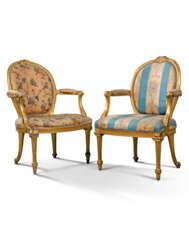 A PAIR OF GEORGE III GILTWOOD ARMCHAIRS