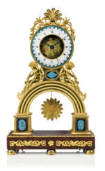 A LATE LOUIS XVI ORMOLU, ENAMEL AND ROUGE GRIOTTE MARBLE SKELETON CLOCK