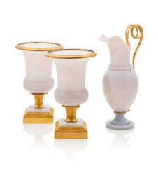 AN ASSEMBLED GARNITURE OF CHARLES X ORMOLU MOUNTED WHITE OPALINE GLASS OBJECTS