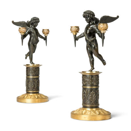 A PAIR OF EMPIRE GILT AND PATINATED BRONZE TWIN-LIGHT CANDELABRA - photo 1