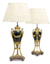 A PAIR OF FRENCH ORMOLU-MOUNTED, PATINATED BRONZE AND EGYPTIAN PORPHYRY LAMPS