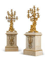 A LARGE PAIR OF NAPOLEON III ORMOLU EIGHT-LIGHT CANDELABRA