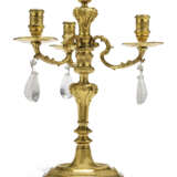 A PAIR OF FRENCH ORMOLU AND ROCK-CRYSTAL THREE-LIGHT CANDELABRA - photo 2