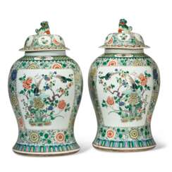 A LARGE PAIR OF CHINESE EXPORT PORCELAIN FAMILLE VERTE JARS AND COVERS