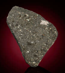 A GIANT INCLUSION OF THE OLDEST MATTER HUMANKIND CAN TOUCH IN ALLENDE END PIECE