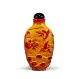A CARVED `REALGAR` GLASS SNUFF BOTTLE - photo 1