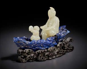 A RARE WHITE JADE AND LAPIS LAZULI CARVING OF FIGURES IN A LOG BOAT