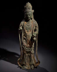 A MAGNIFICENT AND HIGHLY IMPORTANT GILT-BRONZE FIGURE OF GUANYIN