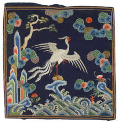 AN EMBROIDERED MIDNIGHT-BLUE SILK RANK BADGE OF A SILVER PHEASANT, BUZI