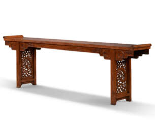 A MAGNIFICENT AND VERY RARE HUANGHUALI TRESTLE-LEG TABLE