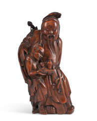 A BAMBOO CARVING OF LU DONGBIN AND DEMON