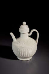 A SUPERB AND VERY RARE CARVED WHITE WARE EWER AND COVER