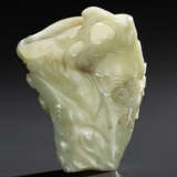 A PALE GREENISH-WHITE JADE VASE - photo 1